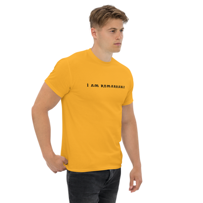 "I am remarkable" printed on a gold unisex classic tee worn by a male