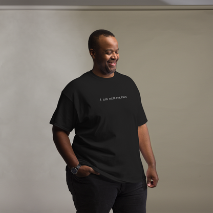 "I am remarkable" printed on a black unisex classic tee worn by a male