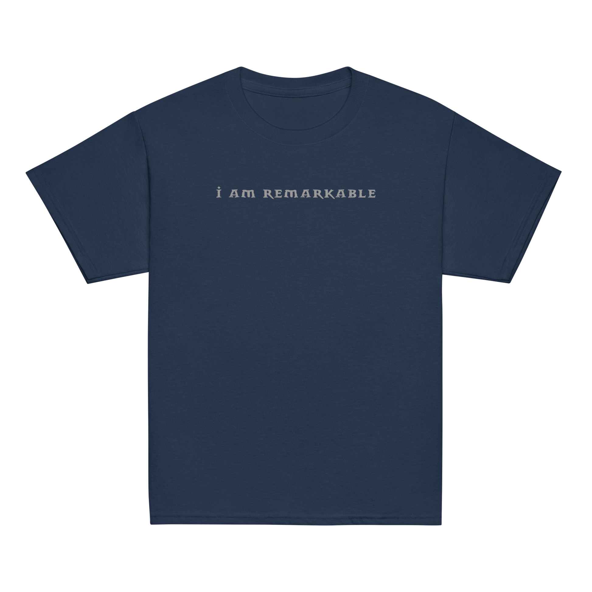 "I am remarkable" printed on a navy youth classic tee laying on a flat surface