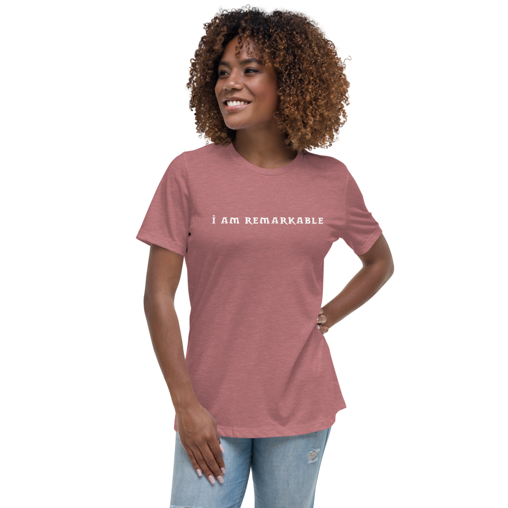 "I am remarkable" printed on a heather mauve women's relaxed t-shirt worn by a female
