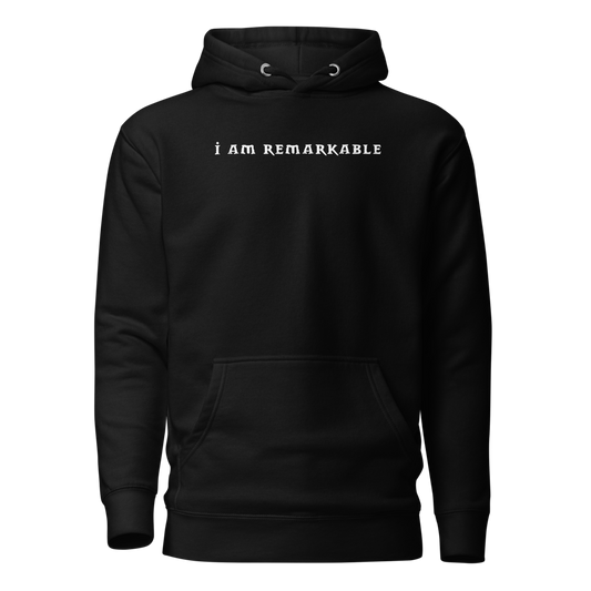 "I am remarkable" printed on a black on an invisible / simulated body