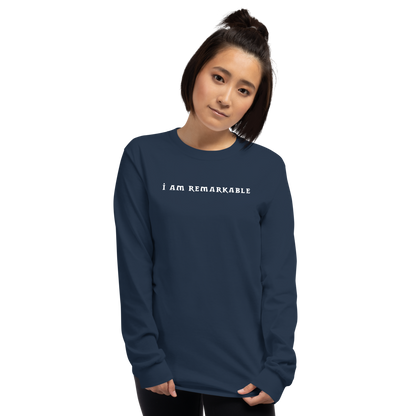 "I am remarkable" printed on a navy men's long sleeve shirt worn by a female