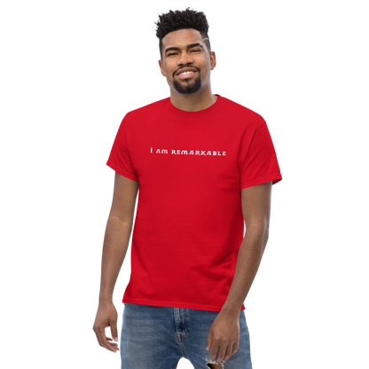 "I am remarkable" printed on a red unisex classic tee worn by a male