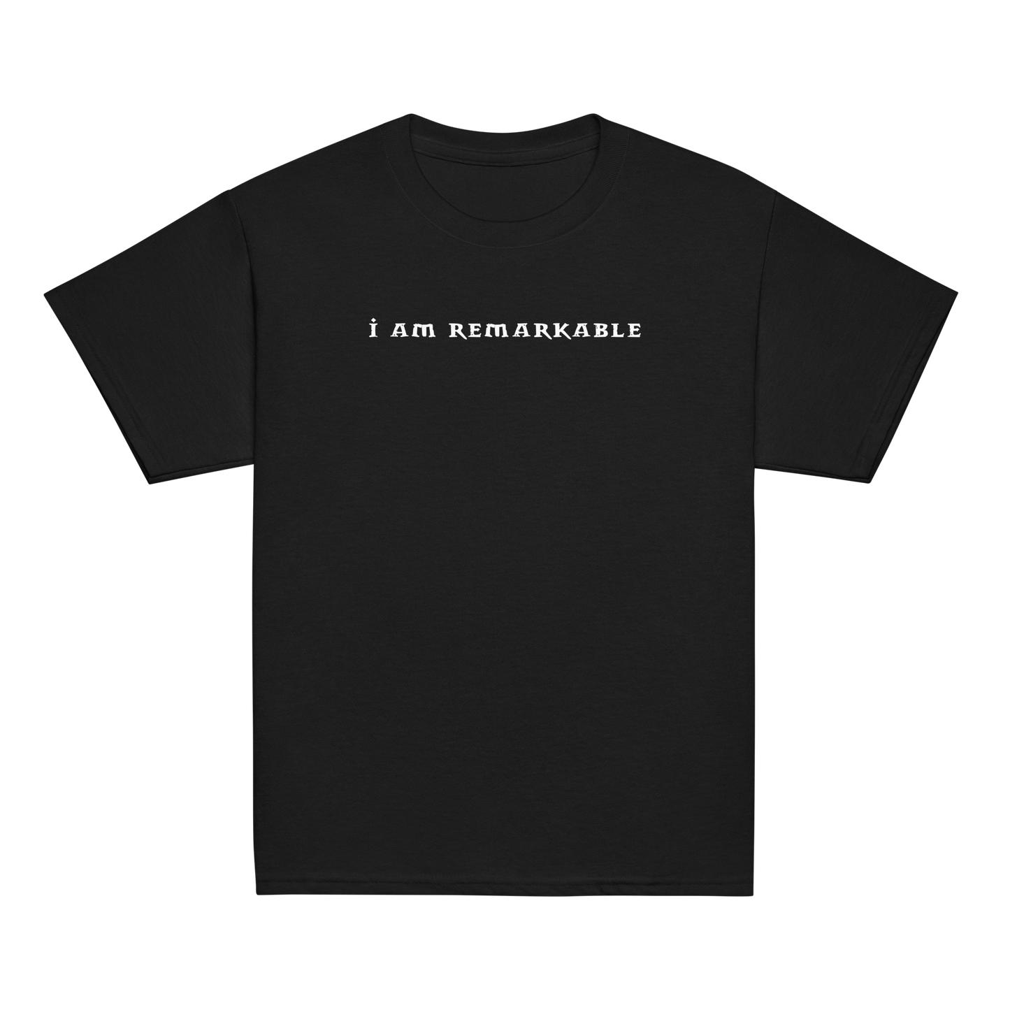 "I am remarkable" printed on a black youth classic tee laying on a flat surface