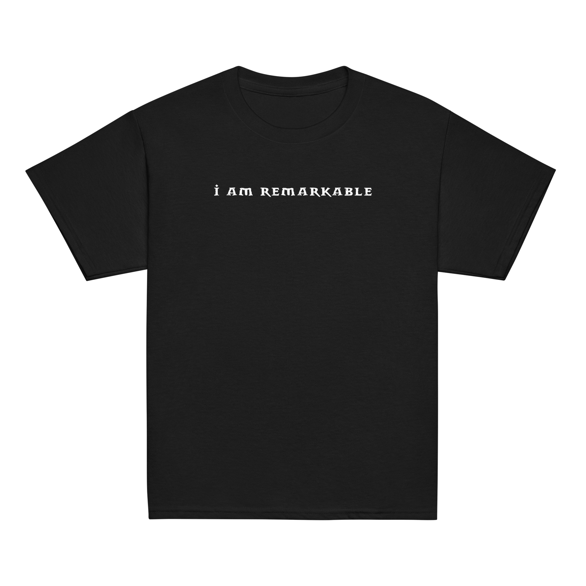 "I am remarkable" printed on a black youth classic tee laying on a flat surface