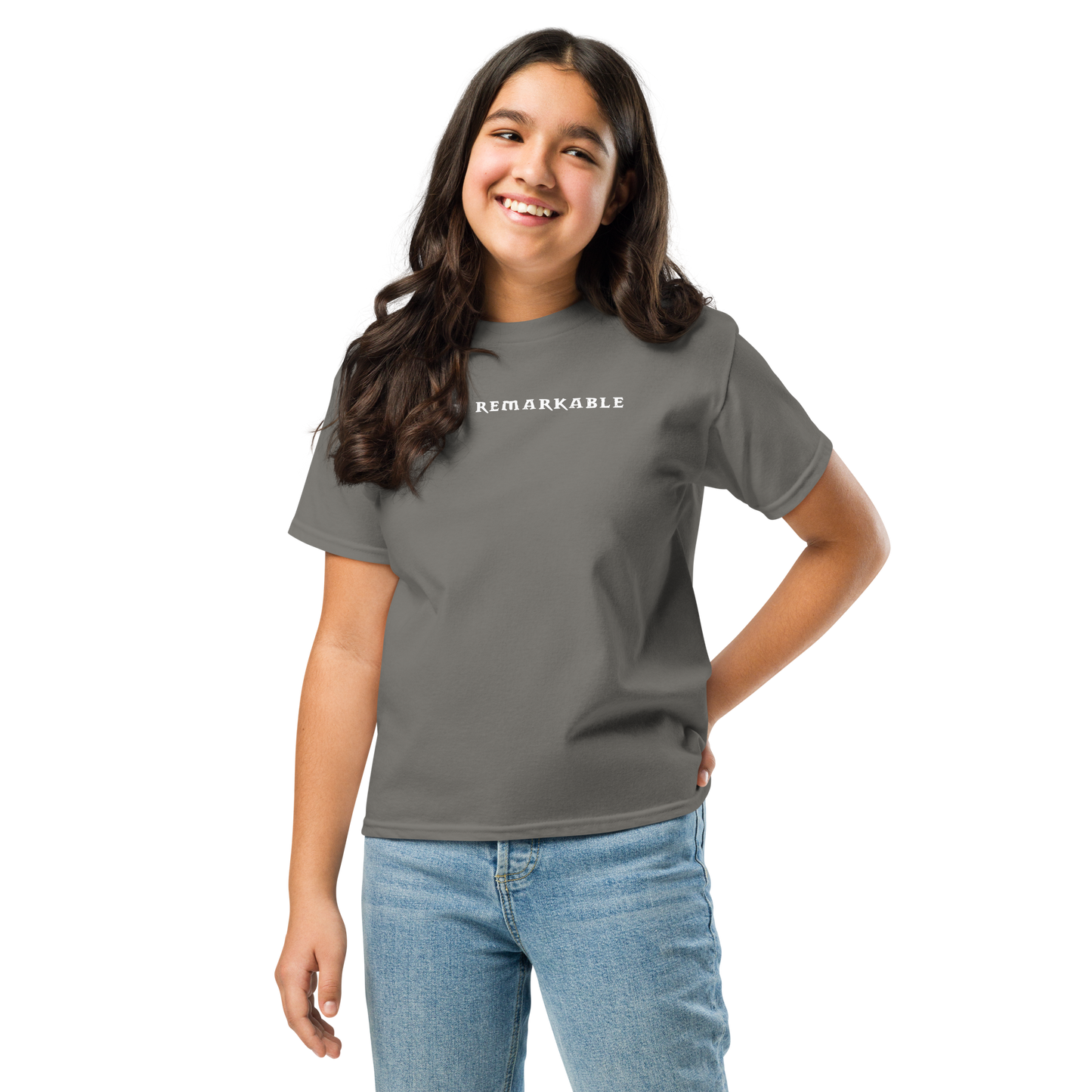 "I am remarkable" printed on a charcoal youth classic tee worn by a female