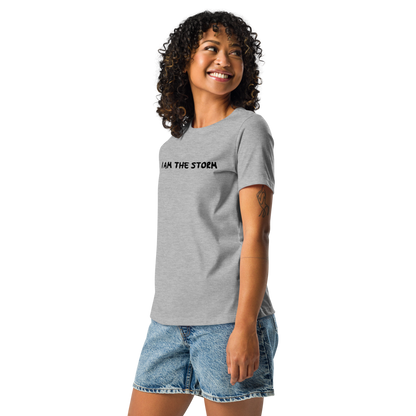 "I am the storm" printed on a athletic heather women's relaxed t-shirt worn by a female