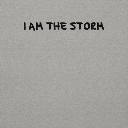 "I am the storm" printed on a carbon grey background