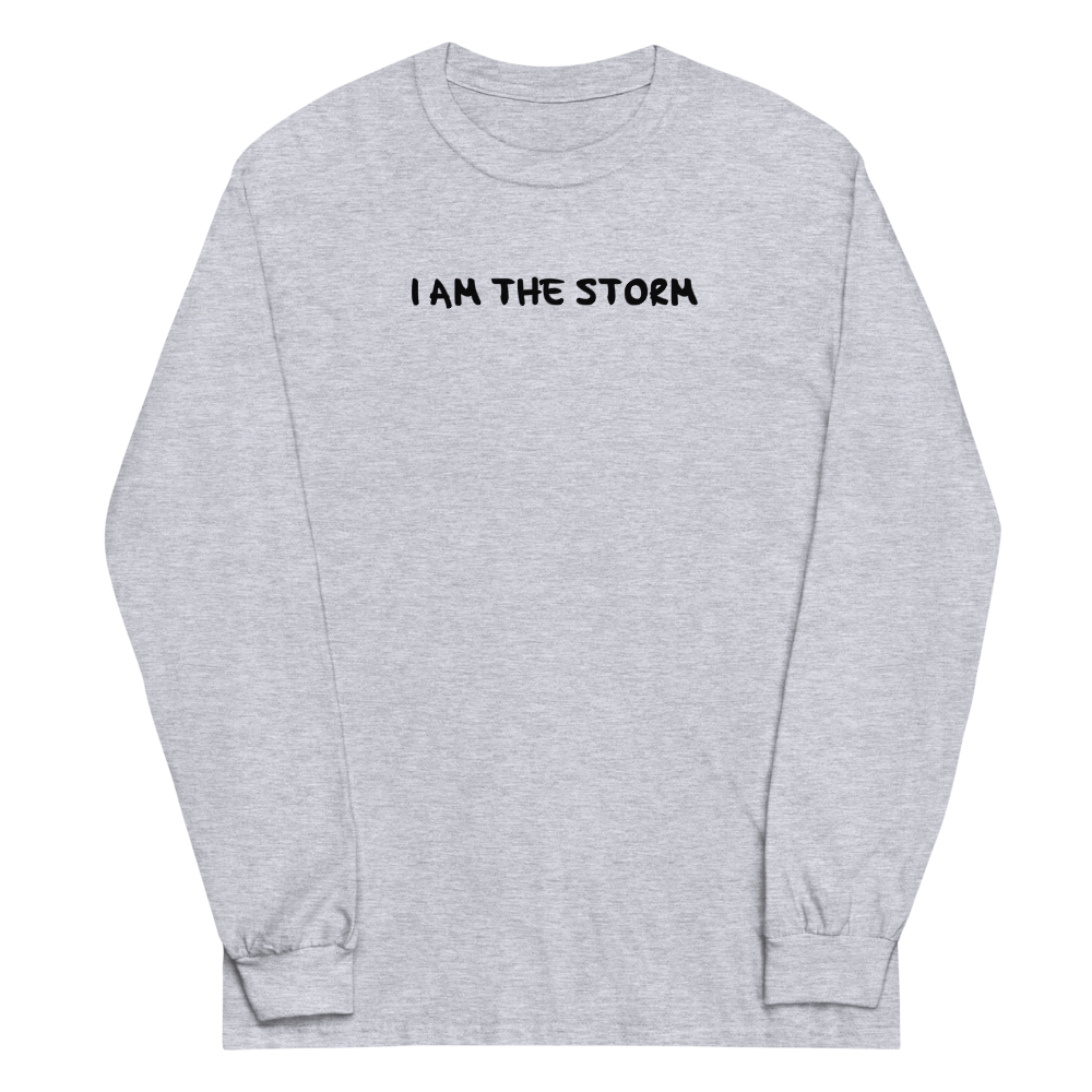 "I am the storm" printed on a sport grey men's long sleeve shirt laying on a flat surface