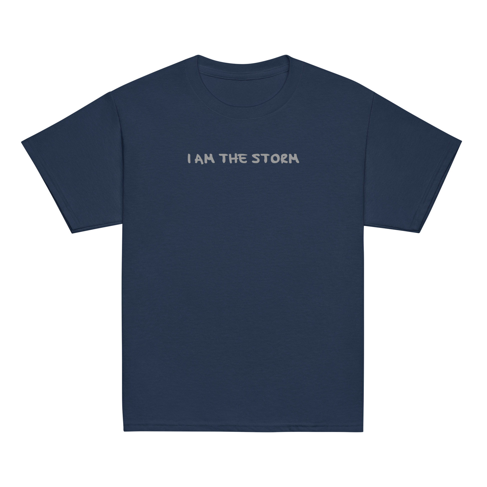 "I am the storm" printed on a navy youth classic tee laying on a flat surface