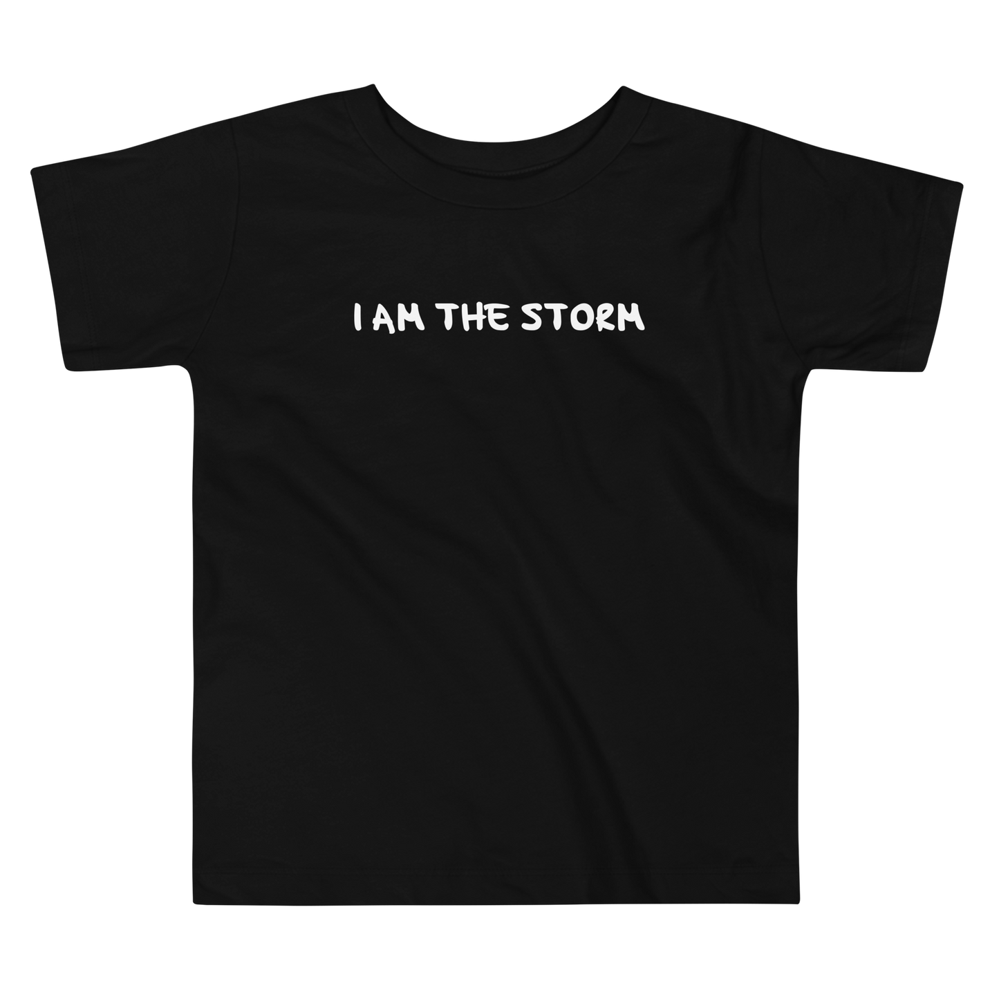 "I am the storm" printed on a black toddler short sleeve tee laying on a flat surface