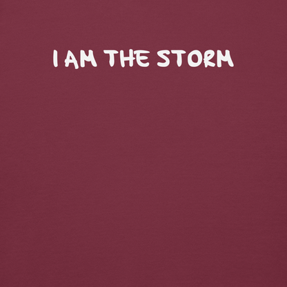 "I am the storm" printed on a maroon background