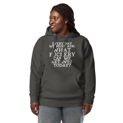 "Every day we must ask: What fuckery can we get into today?" printed on a vintage black unisex hoodie worn by a female