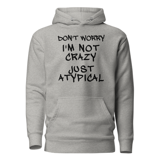 "Don't Worry I'm Not Crazy Just Atypical" printed on a carbon grey on an invisible / simulated body