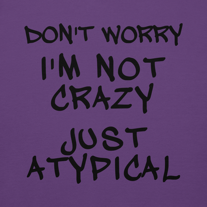 "Don't Worry I'm Not Crazy Just Atypical" printed on a purple background