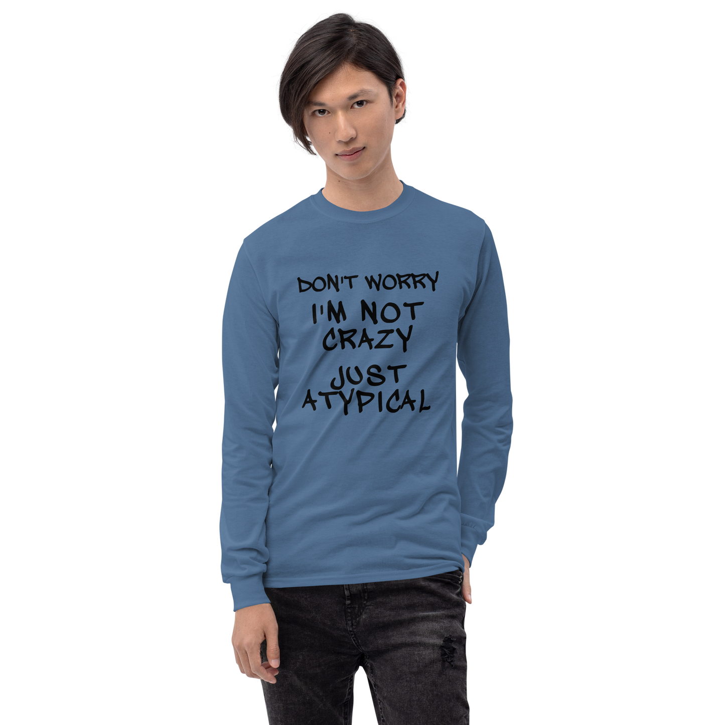 "Don't Worry I'm Not Crazy Just Atypical" printed on a indigo blue men's long sleeve shirt worn by a male