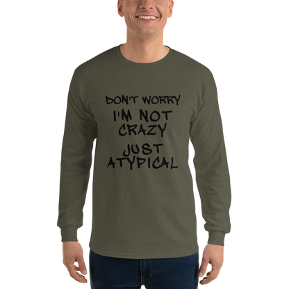 "Don't Worry I'm Not Crazy Just Atypical" printed on a military green men's long sleeve shirt worn by a male
