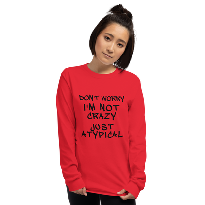 "Don't Worry I'm Not Crazy Just Atypical" printed on a red men's long sleeve shirt worn by a female