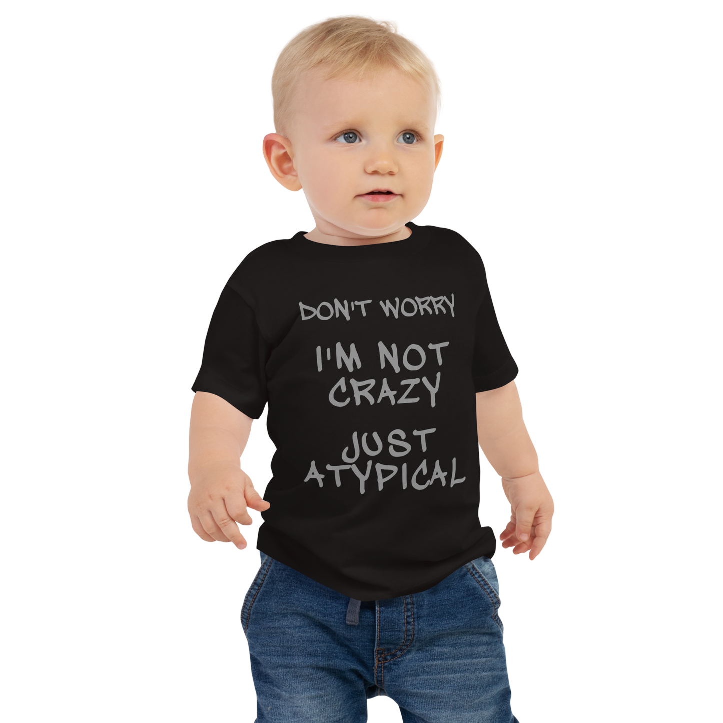 "Don't Worry I'm Not Crazy Just Atypical" printed on a black baby jersey short sleeve tee worn by a male