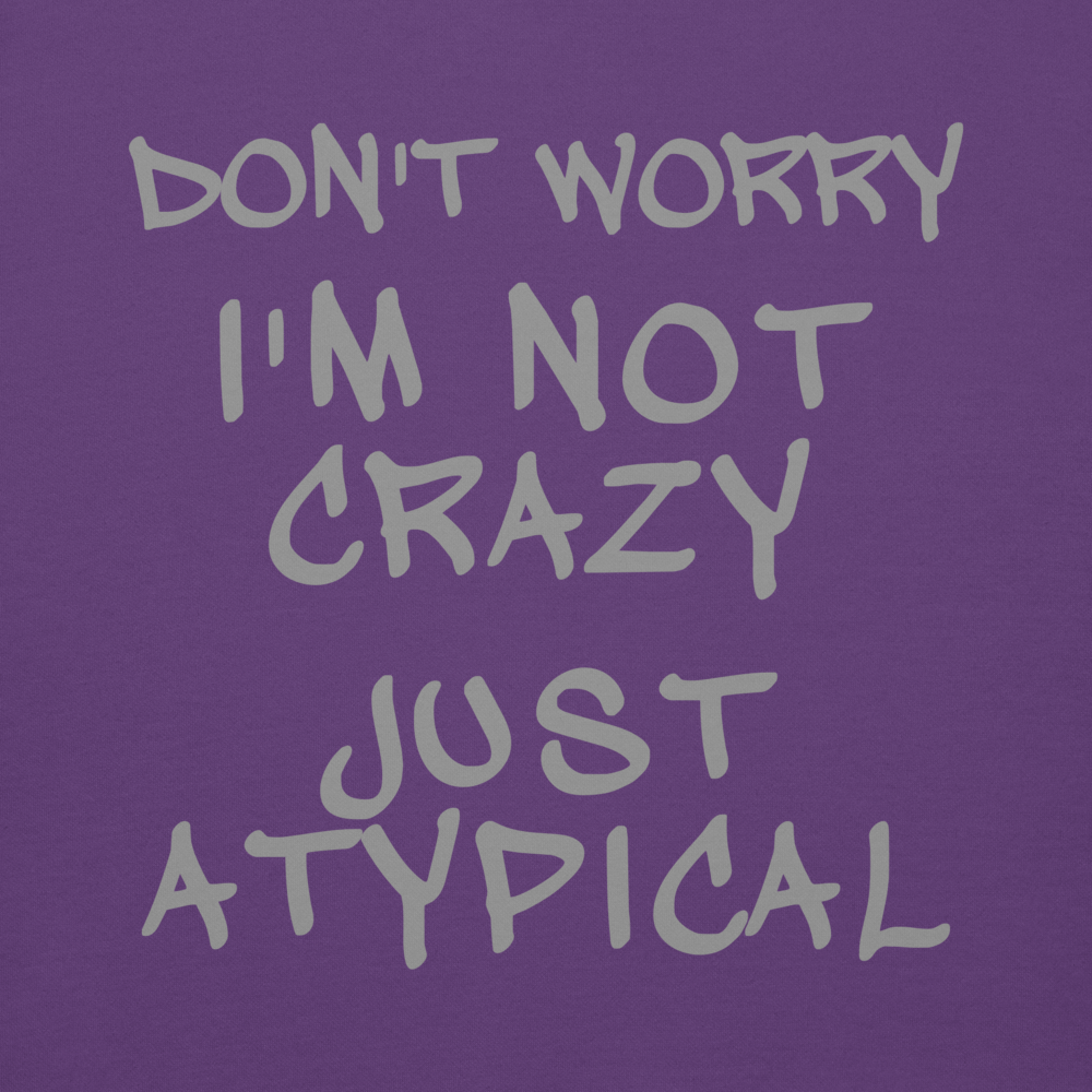 "Don't Worry I'm Not Crazy Just Atypical" printed on a purple background