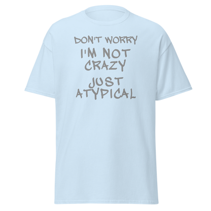 "Don't Worry I'm Not Crazy Just Atypical" printed on a light blue on an invisible body