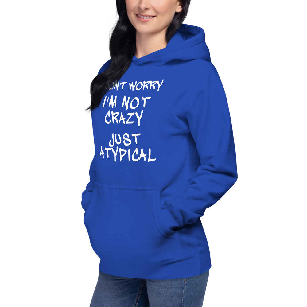 "Don't Worry I'm Not Crazy Just Atypical" printed on a team royal unisex hoodie worn by a female