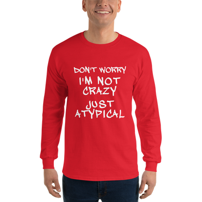 "Don't Worry I'm Not Crazy Just Atypical" printed on a red men's long sleeve shirt worn by a male