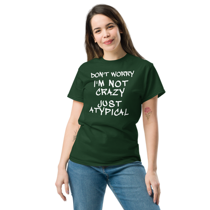 "Don't Worry I'm Not Crazy Just Atypical" printed on a forest green unisex classic tee worn by a female