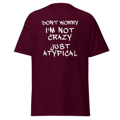 "Don't Worry I'm Not Crazy Just Atypical" printed on a maroon on an invisible body
