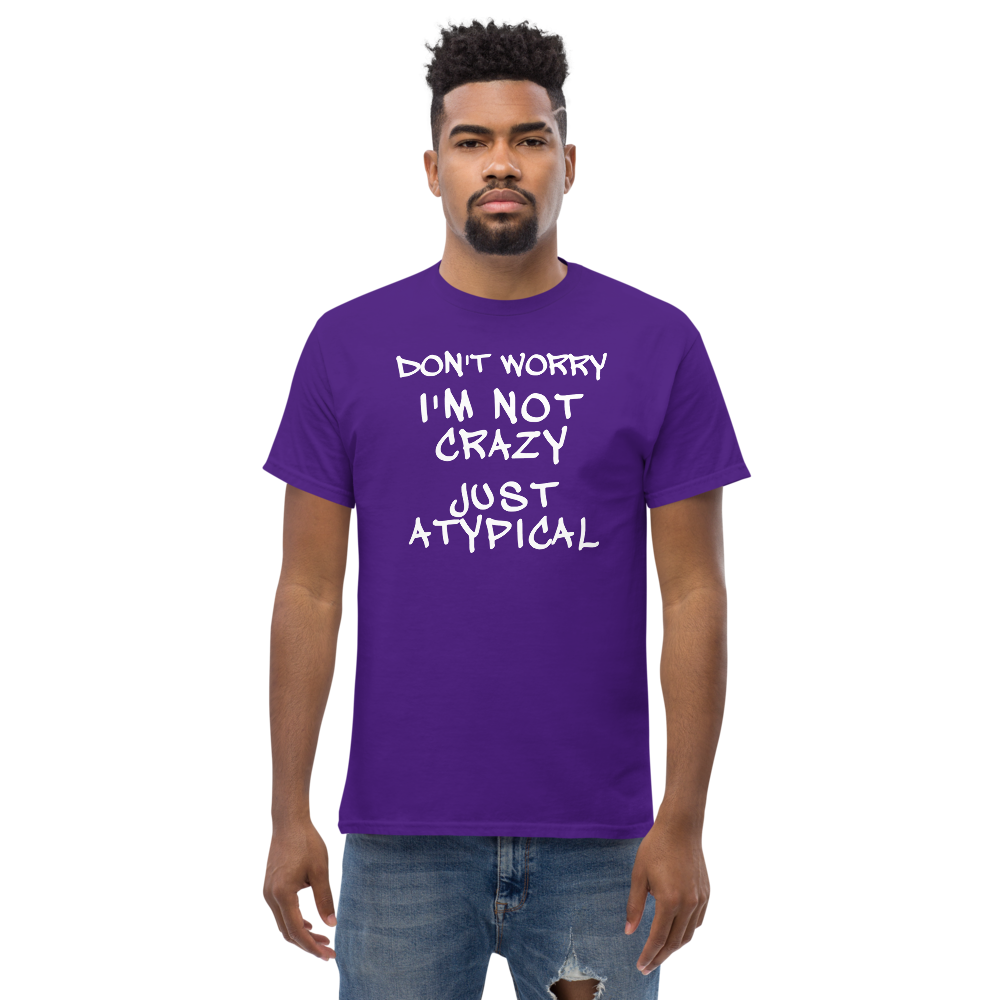 "Don't Worry I'm Not Crazy Just Atypical" printed on a purple unisex classic tee worn by a male