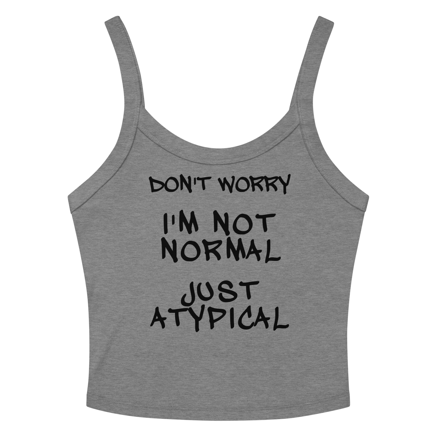 "Don't Worry I'm Not Normal Just Atypical" printed on a athletic heather women's micro-rib tanktop laying on a flat surface amongst sunglasses and shorts