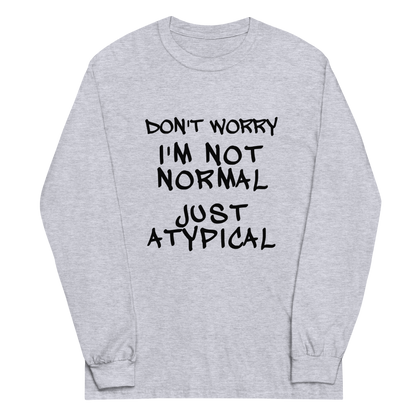 "Don't Worry I'm Not Normal Just Atypical" printed on a sport grey men's long sleeve shirt laying on a flat surface