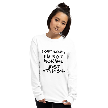 "Don't Worry I'm Not Normal Just Atypical" printed on a white men's long sleeve shirt worn by a female