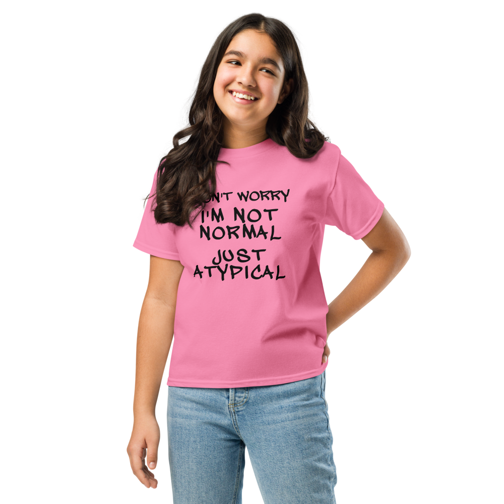 "Don't Worry I'm Not Normal Just Atypical" printed on a azalea youth classic tee worn by a female