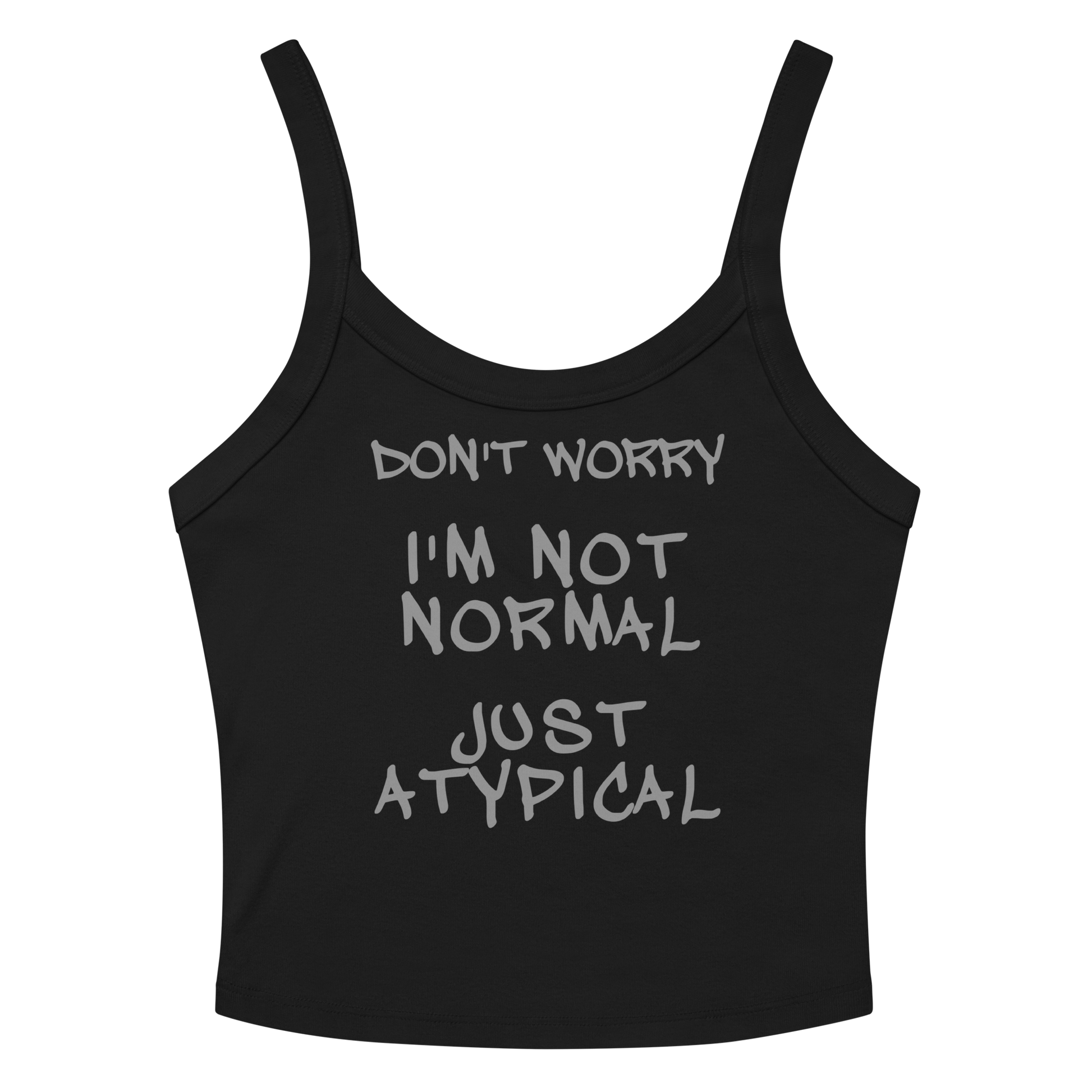 "Don't Worry I'm Not Normal Just Atypical" printed on a solid black blend women's micro-rib tanktop laying on a flat surface amongst sunglasses and shorts