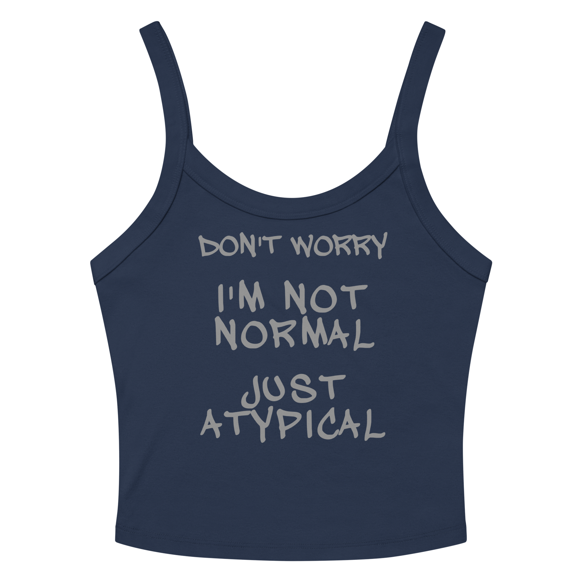 "Don't Worry I'm Not Normal Just Atypical" printed on a solid navy blend women's micro-rib tanktop laying on a flat surface amongst sunglasses and shorts