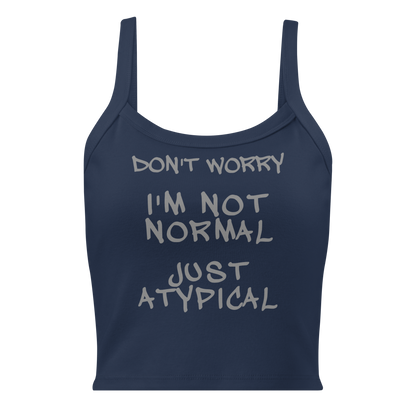 "Don't Worry I'm Not Normal Just Atypical" printed on a solid navy blend women's micro-rib tanktop laying on a flat surface