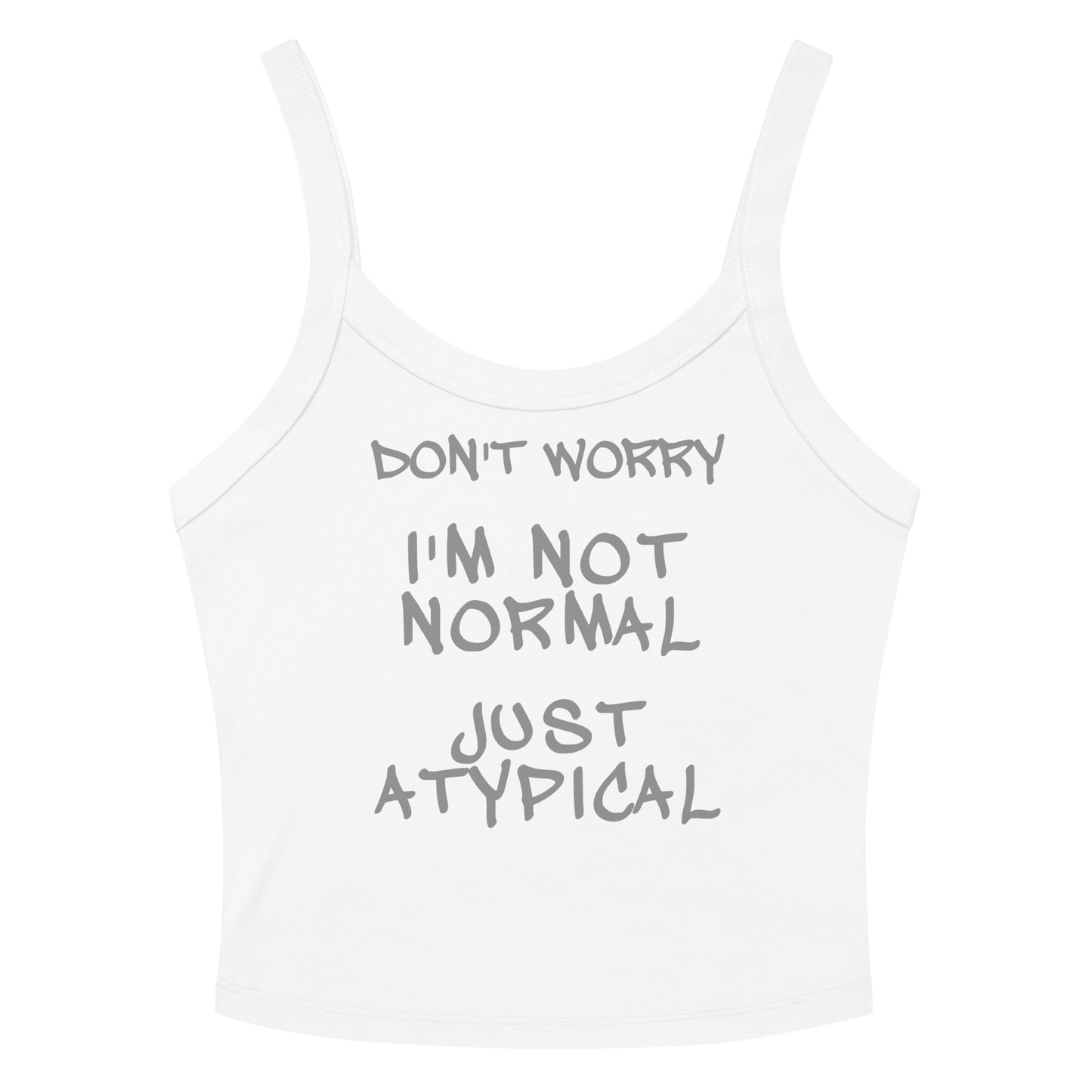 "Don't Worry I'm Not Normal Just Atypical" printed on a solid white blend women's micro-rib tanktop laying on a flat surface amongst sunglasses and shorts