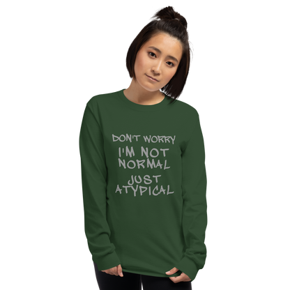 "Don't Worry I'm Not Normal Just Atypical" printed on a forest green men's long sleeve shirt worn by a female