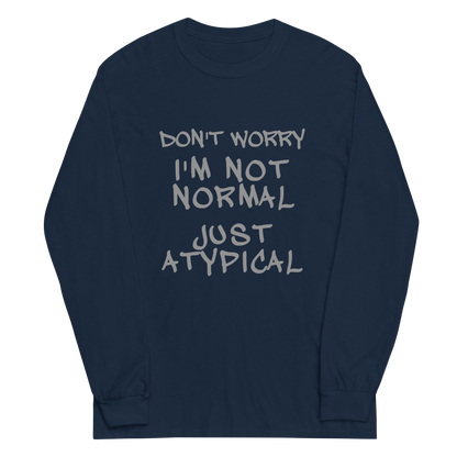 "Don't Worry I'm Not Normal Just Atypical" printed on a navy men's long sleeve shirt laying on a flat surface