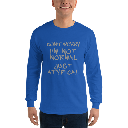 "Don't Worry I'm Not Normal Just Atypical" printed on a royal men's long sleeve shirt worn by a male