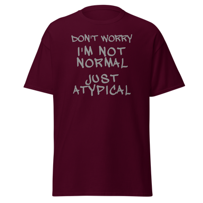 "Don't Worry I'm Not Normal Just Atypical" printed on a maroon on an invisible body