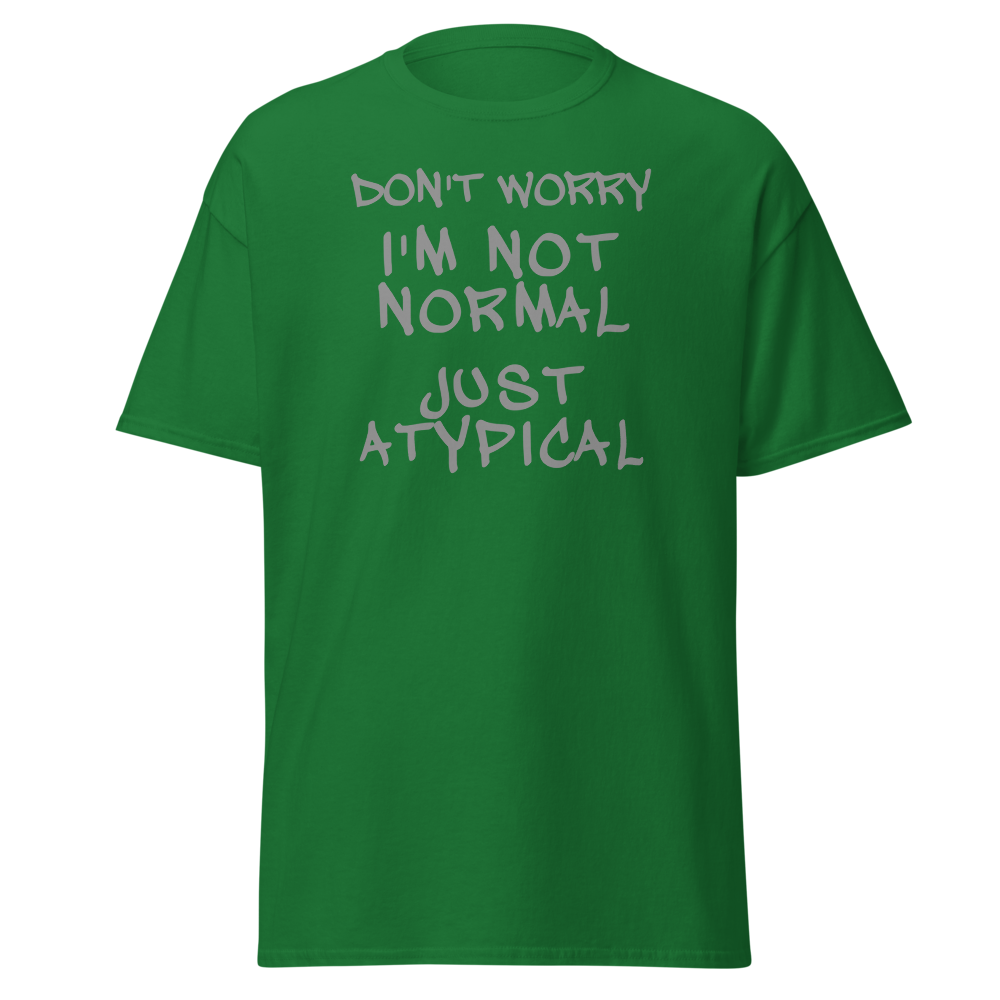 "Don't Worry I'm Not Normal Just Atypical" printed on a turf green on an invisible body