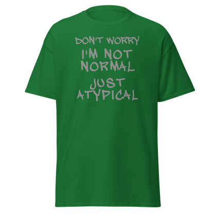 "Don't Worry I'm Not Normal Just Atypical" printed on a turf green on an invisible body