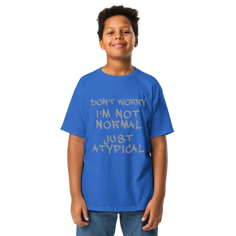 "Don't Worry I'm Not Normal Just Atypical" printed on a royal youth classic tee worn by a male