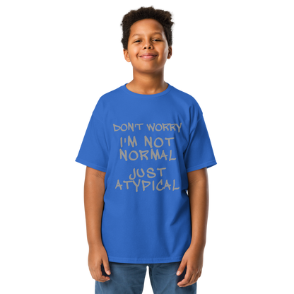 "Don't Worry I'm Not Normal Just Atypical" printed on a royal youth classic tee worn by a male