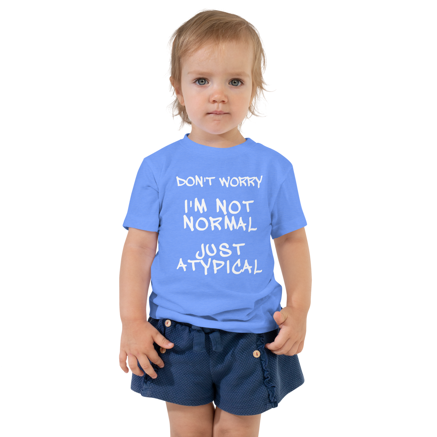 "Don't Worry I'm Not Normal Just Atypical" printed on a heather columbia blue toddler short sleeve tee worn by a female