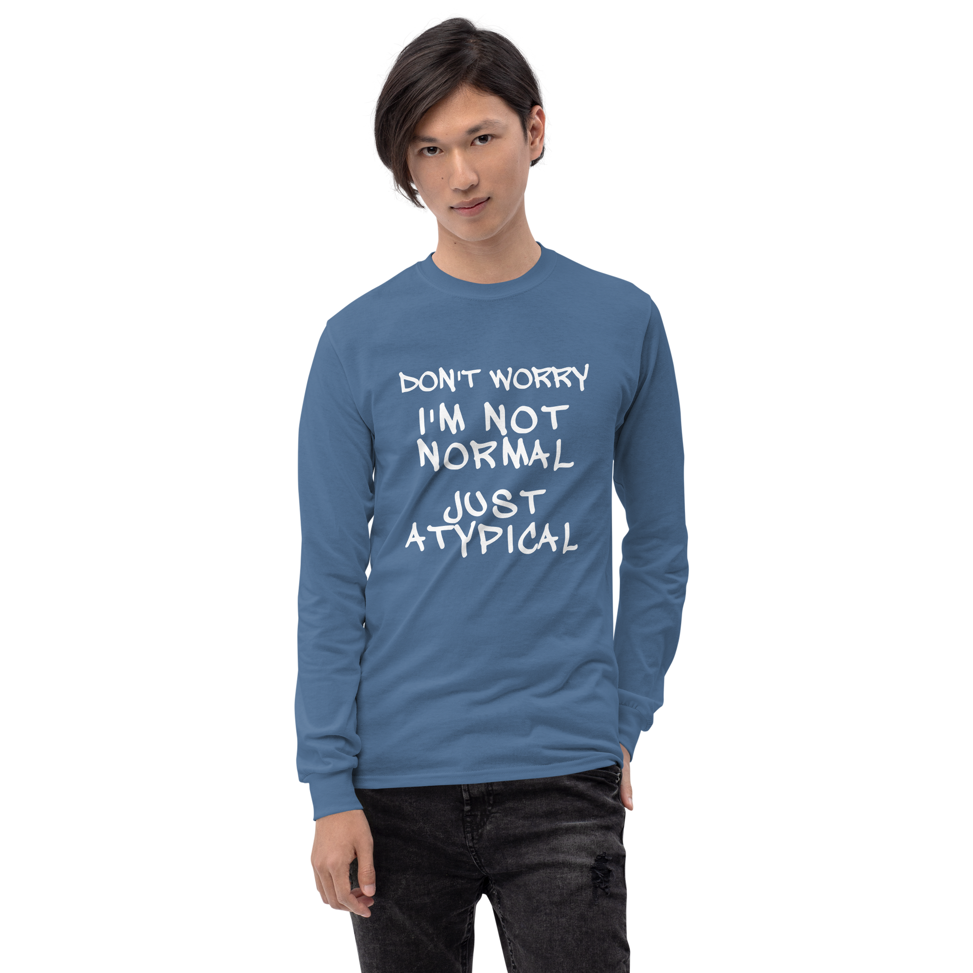"Don't Worry I'm Not Normal Just Atypical" printed on a indigo blue men's long sleeve shirt worn by a male