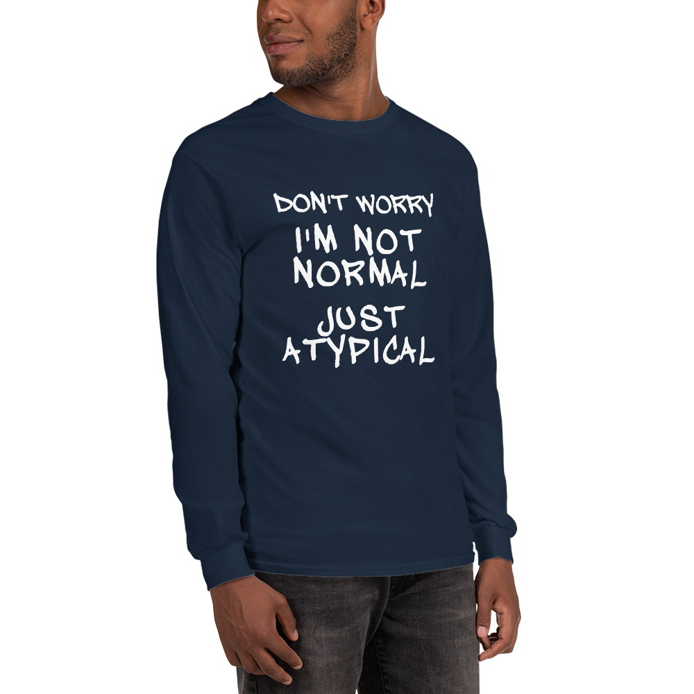 "Don't Worry I'm Not Normal Just Atypical" printed on a navy men's long sleeve shirt worn by a male