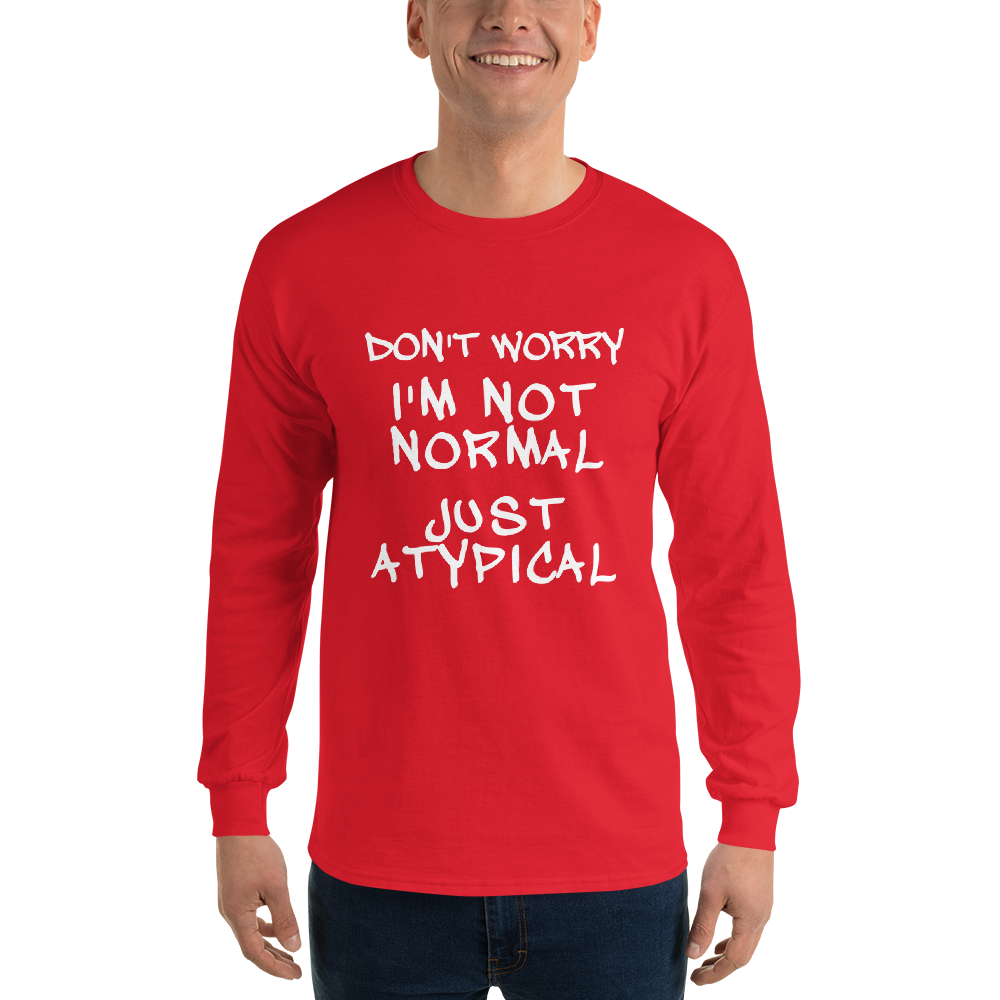 "Don't Worry I'm Not Normal Just Atypical" printed on a red men's long sleeve shirt worn by a male